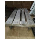 DIY mobile Dolly constructed from a rustic wooden