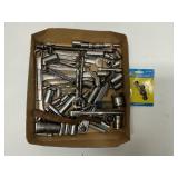Assortment of wrenches and various sockets