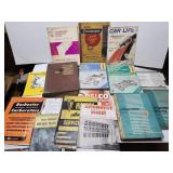 Vintage collection of owner manuals, guides, and