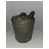 vintage galvanized metal fuel can often used for