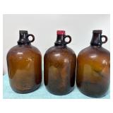 Three One Gallon Brown Glass Jugs