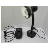 black gooseneck desk lamp and Worx WA4094 battery