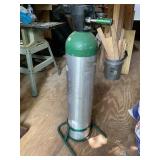 Aluminum oxygen cylinder with green oxygen stand