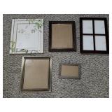 Five decorative picture frames with sizes