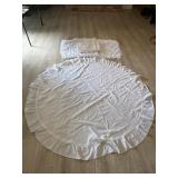 Beautiful round white ruffled table cloth with 4