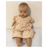 Antique Composition/cloth doll.  Has painted eyes