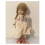 Antique Effanbee composition doll. Has clothes,
