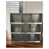industrial-style galvanized metal nine-cubby wall