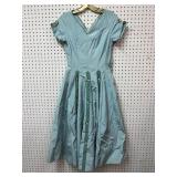 Vintage  Minx Modes blue 1950s dress features a