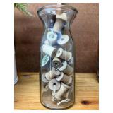 Vintage Glass Jar full of wooden thread spools