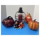 Pumpkins, dolls & candle globe