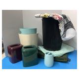Bathroom, rugs, trash cans, shower curtain,