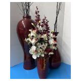 Three floral vases, one has crack