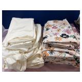 Two Sets of Queen Sheets beige and multi