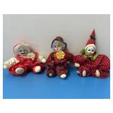 Three small vintage, porcelain faced clown dolls