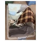 Heating pads, in storage tote. needs to be