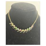 vintage gold-tone necklace featuring vibrant
