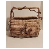 Large rustic woven wicker basket with ivy floral