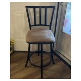 Dark bronze metal barstool with beige suede seat