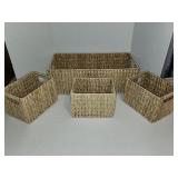 Set of four woven wicker storage baskets