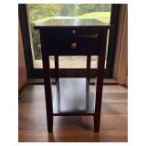 Dark wood side table.   13x22x23.5