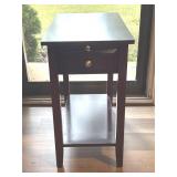 Dark wood side table.  13x22x23