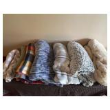 Seven throws/ blankets