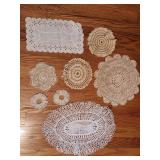 Several crochet cup holder Doilies