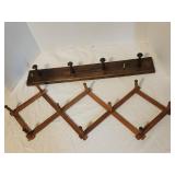 Two vintage wooden wall mounted racks
