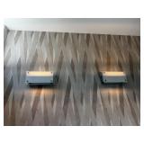 Pair of wall sconces by level lighting
