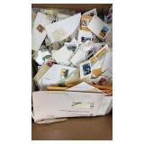 Worldwide Stamps in Bankers Box, on and off paper,