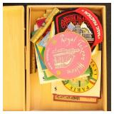 Patches and Labels in old wooden box, many for Hil