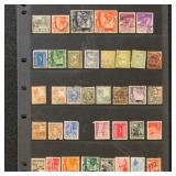 Netherlands Indies Stamps accumulation on pages in