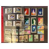 Space Topical Stamps hundreds mounted on black pag