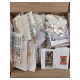 Worldwide Stamps in glassines, dealer cards, loosi