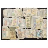 Worldwide Stamps singles & sets in glassines, lots