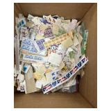 US Mint Stamps, thousands of loose, about half fil