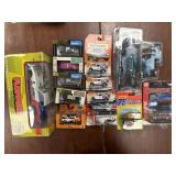 Matchbox, Hot Wheels, and assorted toy cars in box