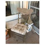 Kitchen chair, hanging flower pot, shop vac, and flower pot