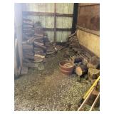 Firewood, axes, pallets, garden hose and sawhorse