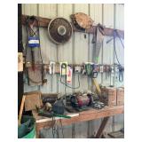 Contents of work bench and wall behind