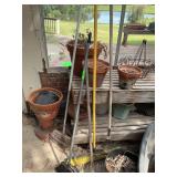 Flower pots, potting table  and leaf rake