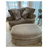 Tan loveseat Ottoman and pillows