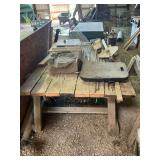 Assorted items- workbench, step ladder, plywood, and misc