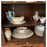 Two shelves of China and glassware