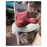 Rocking chair, pillow and rugs