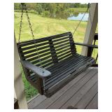 Wooden porch swing