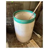 Woven wire, plastic barrel, PVC piping, cedar squirrel feeder