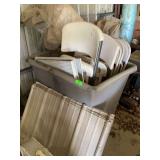 Rolling cart with chairs, two box fans, vent, and two rolls of barbwire