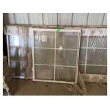 Seven window sashes with cinderblocks